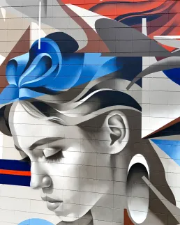 Mural rostros mujeres en Saint Brieuc Francia por Zurik