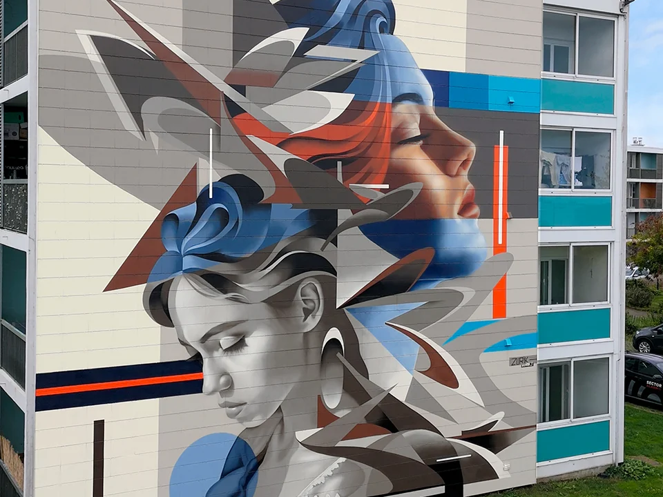 Mural rostros mujeres en Saint Brieuc Francia por Zurik